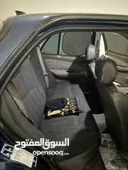  18 كيا سيفيا لون ازرق ميتالك نظيفه مع جنط 15 مميز كاوشوك وكاله غرفه نطيفه بطاريه جديده لسى كفالتها معها