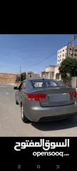  14 كيا فورتي 2010 مواصفات فل si