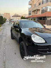  16 بورش كيان 2004 اسود