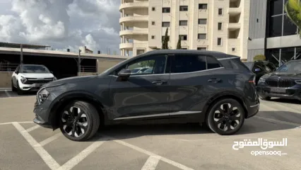  17 كيا سبورتاج ترخيص 2022 محرك 1600 هايبرد plug in/يقطع على الشحنه 65 كيلو متر  271 حصان