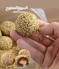  2 تمر محشي طحنيه ومغطس بالسمسم