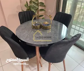  7 طاولة سفرة دائرية مع 4 كراسي سطح الطاولة خشب ملبس فورمايكا – مقاوم للخدوش وسهل التنظيف