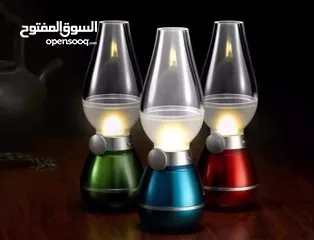  6 مصباح كهربائي بالشحن علي شكل لمبة الجاز يستخدم عند انقطاع الكهرباء جميل ومناسبة للديكور