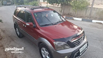  3 جيب كايا سورنتو موديل 2008_(ركاب 6+1)ديزل ماتور 2500دفع رباعي فل فل اضافات مع فتحة سقف مميز من الاخر