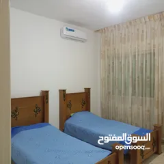  14 شقة مفروشة أرضية للايجار في ضاحية الرشيد 4 مكيفات بكل غرفة مكيف وبئر ماء خاص للشقة