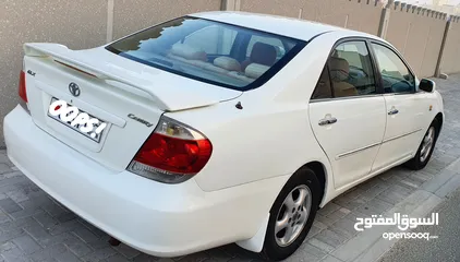  11 Toyota Camry 2006 four cylinder well-maintained 2.4L truble free passing new .