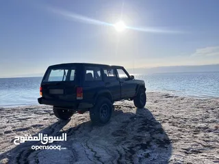  4 للبيع - جيب شيروكي XJ موديل 1999  جاهز للبر والمغامرات!