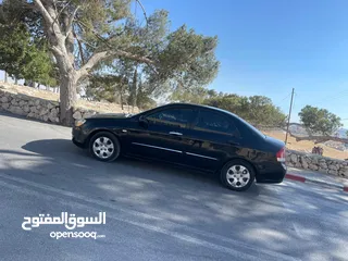  2 كيا سيراتو 2008 ماتور 1600 بنزين اوتومات عدد 2 لون ابيض ولون اسود
