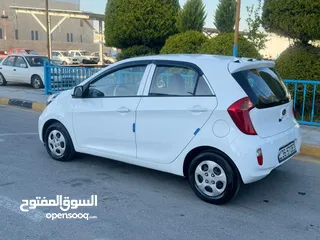 9 كيا بيكانتو موديل 2015 فحص كرررررررررت ابيض ولا ملاحظه الفحص مرفق فل اوتوماتيك
