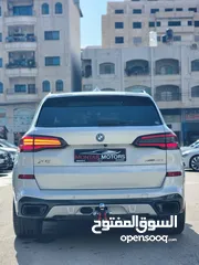  6 BMW X5 45e ترخيص 2022 ترخيص  محرك 3000 هايبرد plug in/يقطع على الشحنه 100 كيلو متر  399 حصان