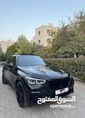  3 BMW X5 45e 2022 كهرباء بنزين محرك 3000  400 حصان دفعه اولى وشكات 36 شهر بدون بنوك أو مؤسسات