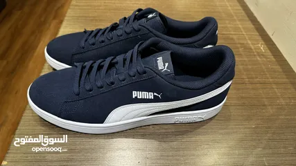  1 Puma dark blue trainers 46