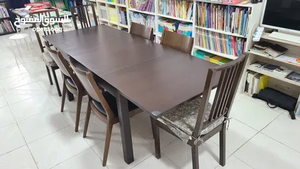  1 Good quality dining table and 7 chairs
