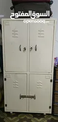  1 metal cupboard with lock