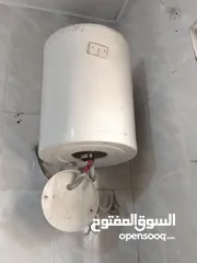  4 جيزر مصري شغال وطقم حمامات مغاسل للبيع مع الحنفيات كامل