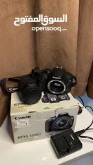 1 كاميرة كانون 1200 دي