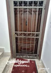  1 ,باب حديد حمايه وباب خشب