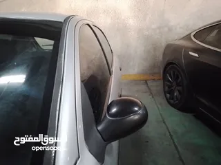  2 سياره بيجو  206  موديل  2006  للبيع  لون فضي   بحاله جيده جدا