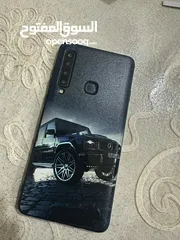  4 سامسونج A9 بحالة ممتازه مع كرتونته