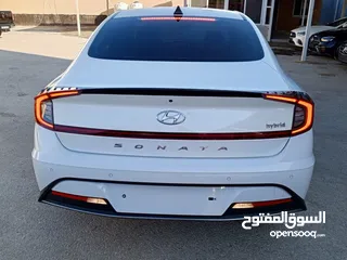  5 SONATA HYBRID 2020 ابيض لؤلؤي كوري  عداد 32 الف كيلو