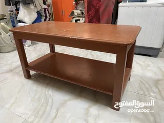  1 Wooden table for 10 rials