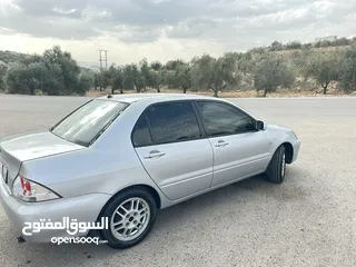  5 ميتسوبيشي لانسر 2007 ماتور 16 اتوماتيك  / وارد الكويت فحص كامل / كاش أو اقساط
