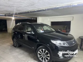  2 كيا سورينتو 2013  13000 دينار