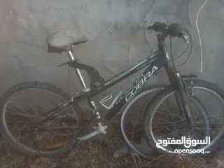 1 بسكلي شغال بس ناقصه جونيين