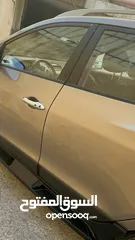  7 2009 ‏Hyundai توسان LX20 اربع ابواب، اللون فيراني، الكراسي جلد والسيارة 92,000 كيلو فقط وبحالة رائعة