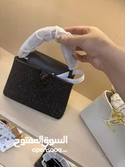  2 حقائب ديور، لويس فيتون، شانيل، جوتشي، بربري