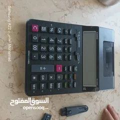  1 الة حاسبة مع طباعة رول