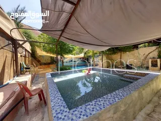 52 منتزه و مطعم مرخص للبيع عمان - البحاث مرج الحمام على مساحة ارض 4000م