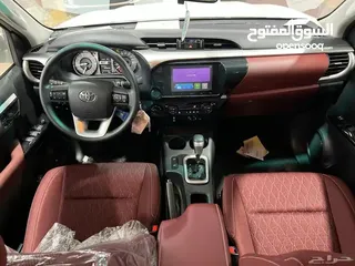  25 تويوتا هايلكس S-GLX اعلى المواصفات باللون الابيض المميز 2024