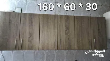  1 بسم الله الرحمن الرحيم خزانة مطبخ تعليق خشب mdf ملبس لامنيت  سماكه  18  ال6 ابواب السعر 50دينار ال4