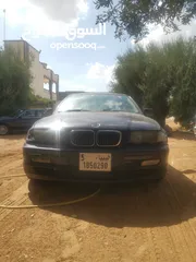  4 BMW320 كنبيو عادي فاها دخان نقوص زيت مايتسماش