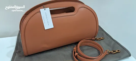  14 tags on new camel handbag unique with detachable strap