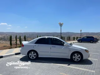  10 كيا سيراتو 2008 ماتور 1600 بنزين اوتومات عدد 2 لون ابيض ولون اسود