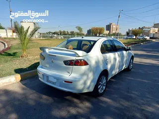  5 لانسر خليجي ماشيه 44 الف فقط كفاله