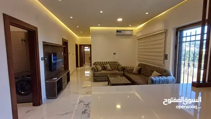  1 شقة ارضية مفروشة لم تسكن في - عبدون - مساحة 220 متر بترس و كراج خاص (ID#: 65206)