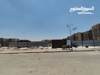  2 محل تجاري في منطقه 390 فدان في حداىق أكتوبر بجوار ابني بيتك السابعه و مشروع 557 عماره