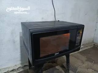 5 ميكرويف سونا 45لتر لون اسود مع نظام شواي داخليه بحال الوكاله قابل للتفاوض يوجد توصيل