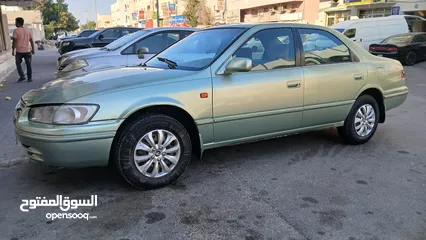  3 toyota camry green model 2000