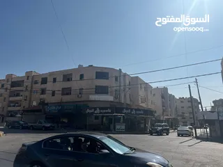  17 مجمع تجاري في وسط إربد عبارة عن محلات وشقق مع تسوية