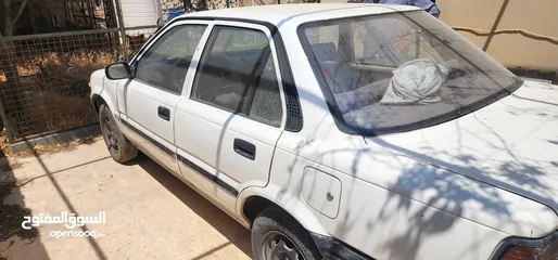  10 تويوتا كورولا موديل 88 للبيع لون ابيض ترخيص جديد