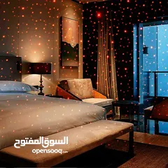  2 وصلة اضاءه ليزر نقاط حمراء او  بنفسجيه على مدخل usb داخل السياره او المنزل مرنه بالتحكم بتوجيه الاضا