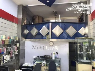  7 محل تجاري للبيع مجهز كامل موقع مميز ملاصق لمعرض شركة زين - شارع باب الواد - الوسط التجاري/ الزرقاء