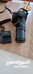  11 كاميرا كانون D2000 مع عدسة 75-300 للبيع بسعر مغري جداااا