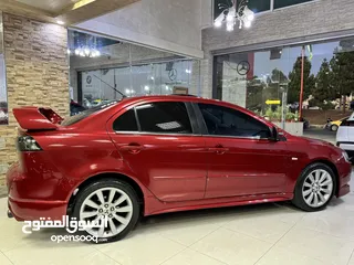  15 ميتسوبيشي لانسر موديل 2015 GT اصلي فحص كامل بحالة الوكاله فل كامل اعلى صنف من فئتها