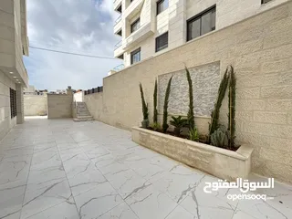  16 شقة طابق شبه ارضي للبيع مساحة 200م مع ترس وحديقه وكراج 250م بأجمل مناطق خلدا (مشروع 114