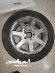  1 كوشوك مع جنط كوشوك بحالة ممتازة